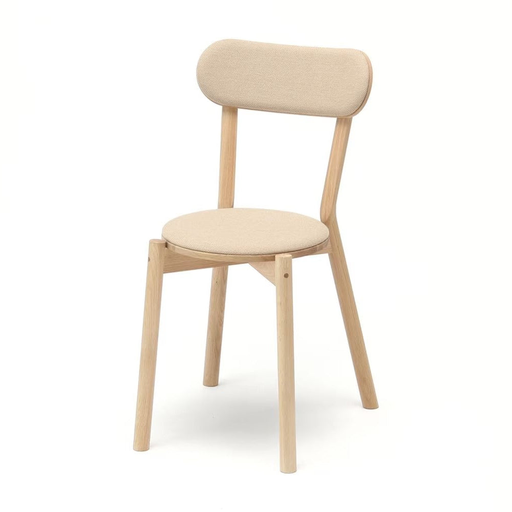 Beige upholstered dining chair with oak frame